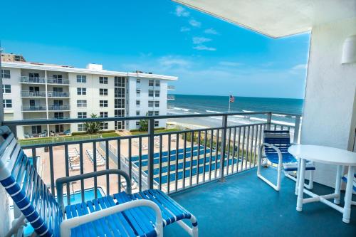 Stunning coastal condo with ocean and pool views from the balcony!