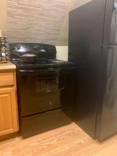 Entire 1 Bedroom Top Floor Rental Unit with Patio in Chicago, USA