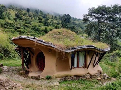 Unique Mud Home With Scenic Mountain Views