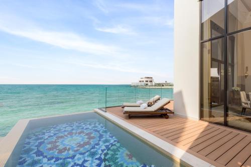 Family water villa with exclusive infinity swimming pool