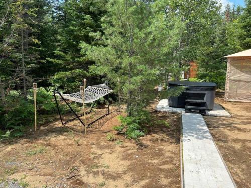 Chalet Alice à louer avec Spa Mauricie (Chalet Alice a louer avec Spa Mauricie) in แซ็ง อเลซี เด มงต์ (ควิเบ)