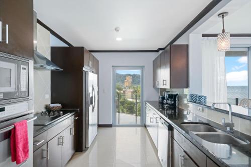 Ocean View Luxury Penthouse at Diamonte del Sol 702N - image 4