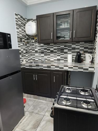 Magnifique Appartement à Kotto, Calme, Propre et Sécurisé avec groupe Electrogène et WiFi (Magnifique Appartement a Kotto, Calme, Propre et Securise avec groupe Electrogene et WiFi) in 路波姆