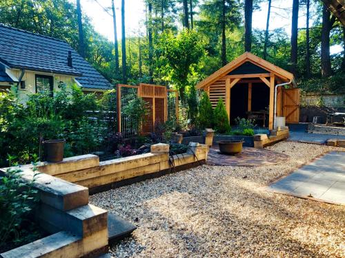 A szálláshely kívülről, Veluwe vakantiehuis - Bosuil Lodge in Lunterse Buurtbos