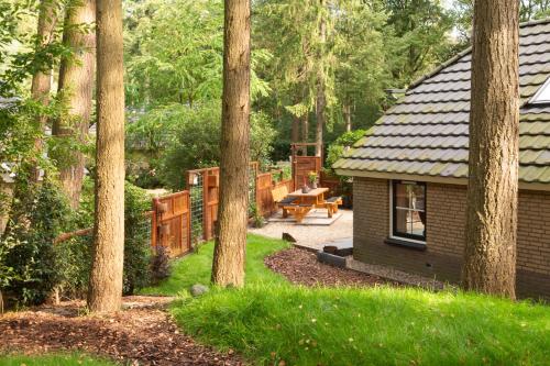 Kert, Veluwe vakantiehuis - Bosuil Lodge in Lunterse Buurtbos