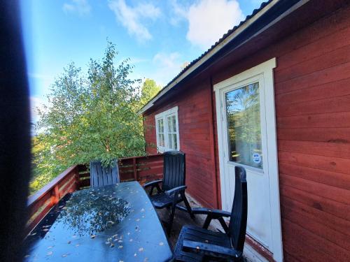 Balkon/Terrasse, Vikinggård Cottages (Vikinggard Cottages) in Holjes