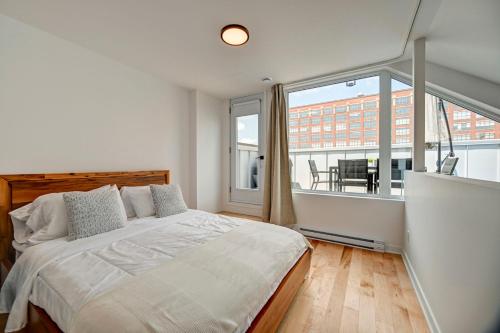 Penthouse Downtown 2BR 2BA Private Roof Terrace presented by TripMontreal in Southwest