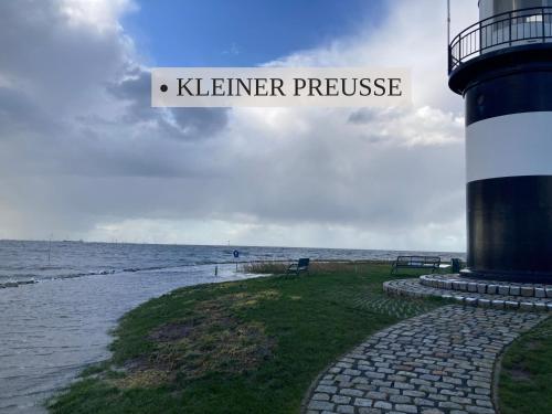 Krabbe Nordsee Apartment 2, ideal für Paare, kostenfreier Parkplatz, 2 Hunde willkommen, am Elbe-Weser-Radweg mit Unterstellmöglichkeit für Rad und E-Bike, gute Zuganbindung, zentral gelegen