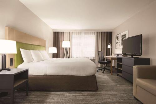 卡尔森江山旅馆及套房 - 迪比克