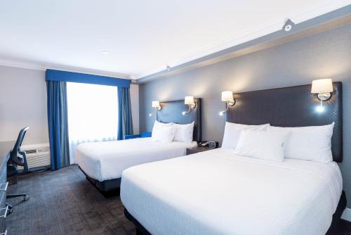 Standard Room, 2 Queen Beds room in Sandman Signature Edmonton South Hotel
