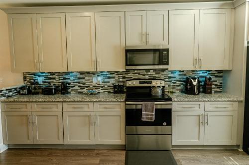 Kitchen, Enjoy this mini-mansion near downtown and the airport! in Browns Mill Park