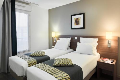 Zenitude Hôtel Résidences Roissy Village photo 4