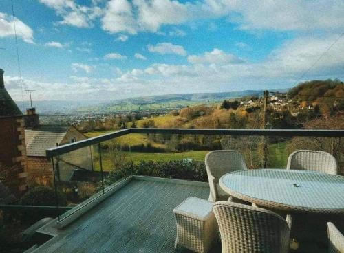 A Cotswold Cabin with Great Views and a Hot Tub in Whiteshill