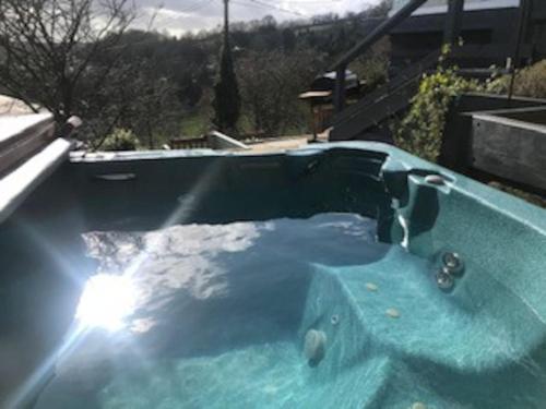 A Cotswold Cabin with Great Views and a Hot Tub in Whiteshill