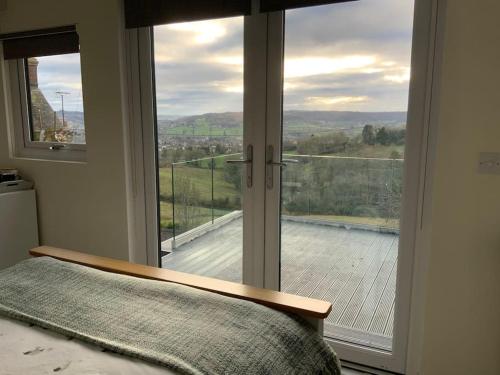 A Cotswold Cabin with Great Views and a Hot Tub in Whiteshill