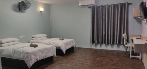 Tazrah roomstay (1 queen or 2 twin super single room) Tazrah roomstay (1 queen or 2 twin super single room)