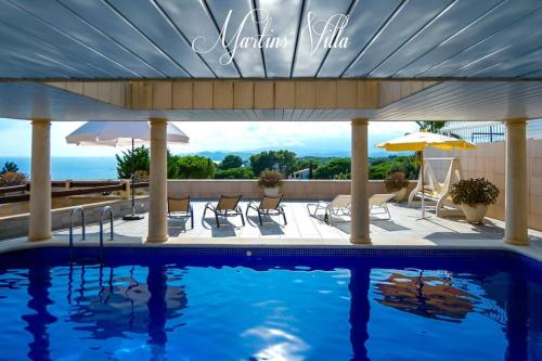 Martin 's Villa. House on the beach with pool