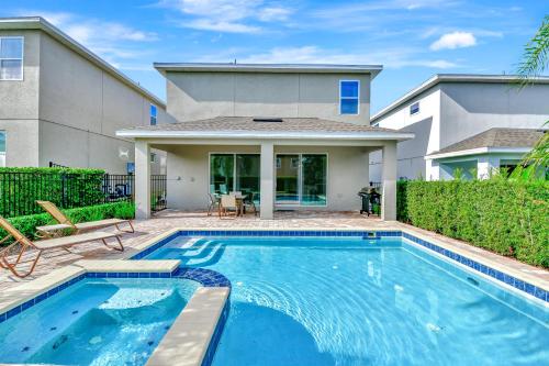 Spacious Home with Private Pool and Game Room near Disney with Resort Amenities by Rentyl 660L
