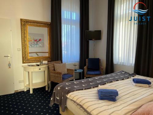 Pension Marie Luise 253 - Zimmer Meerschnecke in 尤斯特