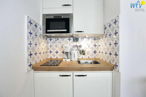 кухня, Haus Janine Ferienwohnung Meeresblume in Юйст