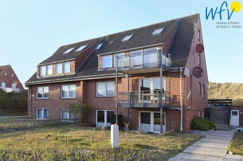 Зовнішній вигляд готелю, Haus Janine Ferienwohnung Meeresblume in Юйст