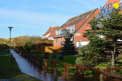 Зовнішній вигляд готелю, Haus Janine Ferienwohnung Meeresblume in Юйст