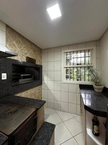 apartamento em bairro nobre suíte com ar condicionado e banheira com hidromassagem (apartamento em bairro nobre suite com ar condicionado e banheira com hidromassagem) in Borgo