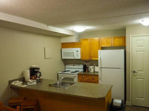 Cozy apartment in the heart of Panorama in พาโนรามา (BC)