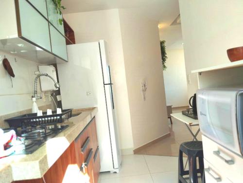 مطبخ, Apartamento aconchegante em condomínio perto da praia (Apartamento aconchegante em condominio perto da praia) in ايلهوس