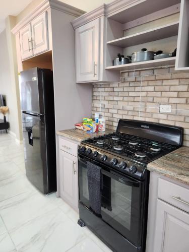 Malik SuitesGY in West Bank Demerara