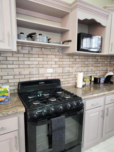 Malik SuitesGY in West Bank Demerara