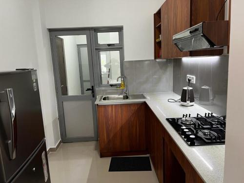 Konyha, Canterbury Residence Garden Apartments in Polgasowita