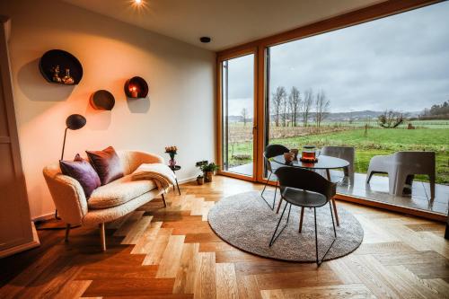 Skats, Der Schwarzbau - Luxus Ferienhaus und Ferienwohnung in Runding