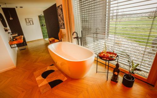 Vannas istaba, Der Schwarzbau - Luxus Ferienhaus und Ferienwohnung in Runding