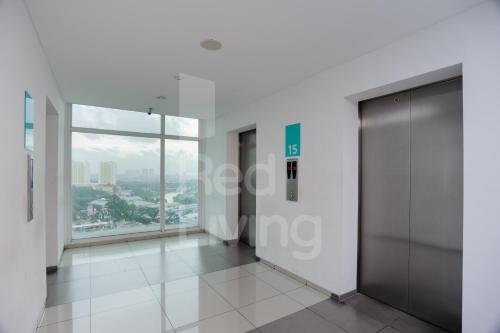 RedLiving Apartemen TreePark City - Hunian Idamanku Tower Alpine