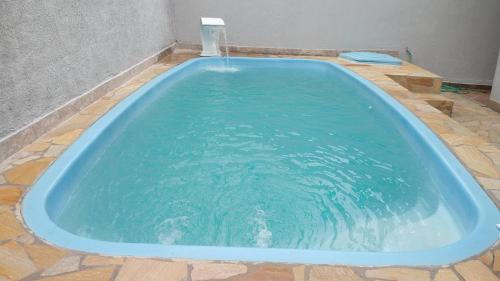 Condomínio de 4 sobrados c/ piscina e churrasqueira - Martim de Sá