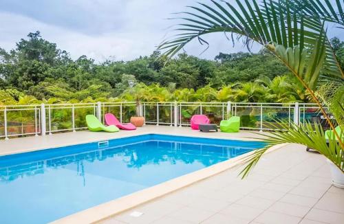 Maison de 2 chambres avec piscine partagee spa et jardin clos a Le Moule a 7 km de la plage