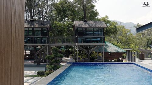 Swimming pool, Emon Pulo Beach Resort near Mount Balingkilat