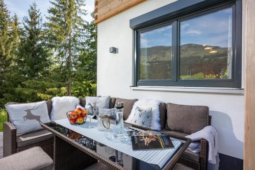 Erkély/terasz, Chalet Alpenherz in Rattenbach