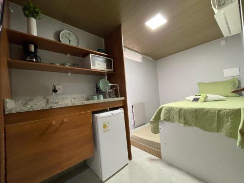 STUDIO aconchego, com Ar, Wifi, Smartv e Cozinha, Macaé (fotografie 8)
