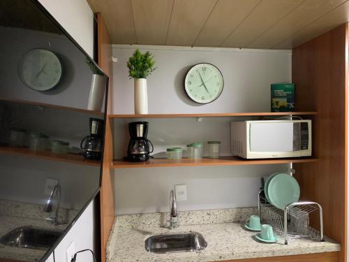STUDIO aconchego, com Ar, Wifi, Smartv e Cozinha, Macaé (fotografie 9)