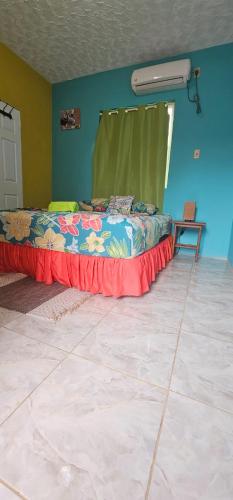 Fish Tobago Guesthouse or Joy and Brandon Guesthouse in Буккоо