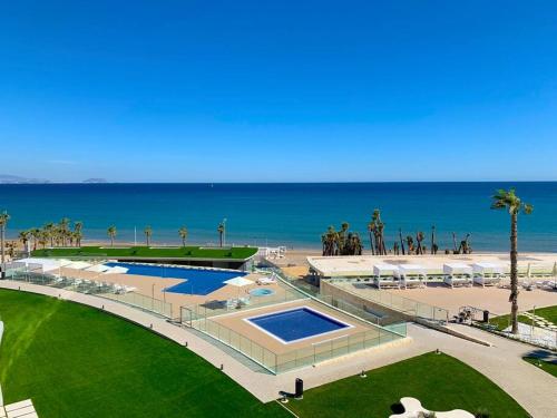 Luxe apartment San Juan beach, HEATED POOL.