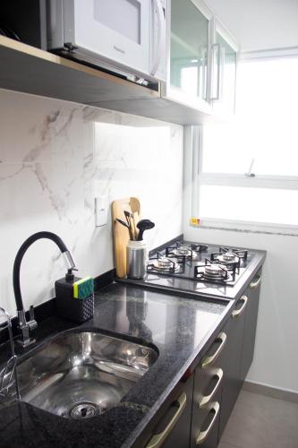 Kitchen, Studio Girassol in Trindade