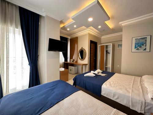 Superior Triple Room room in Serenity suites Hotel