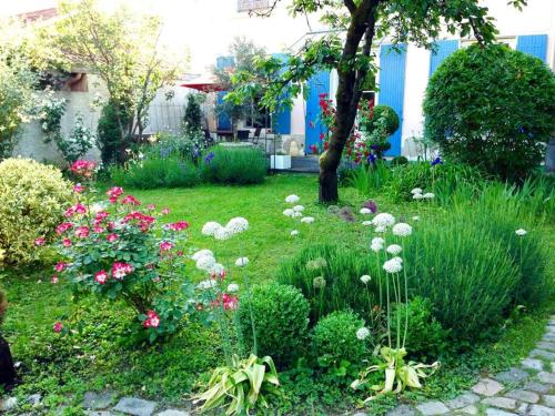 Un jardin en ville - Parking - Location saisonnière - Lyon