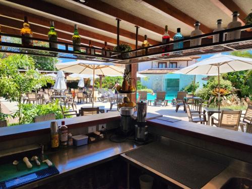 bar/salon, Pousada dos Tangaras in plaža Geriba