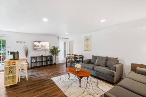 Charming basement w/ firepit and above ground pool