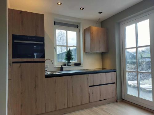  Comfortable house with a garden, parking spot and a hot tub in Wierden