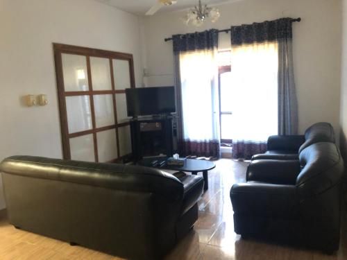 Shared lounge/TV area, Feel Like Home Hostel Anuradhapura in Anuradhapura